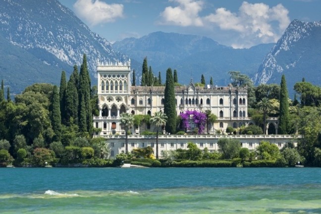 a view of water and a mountain in the background