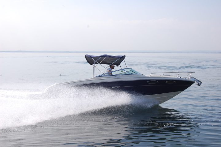 a small boat in a body of water