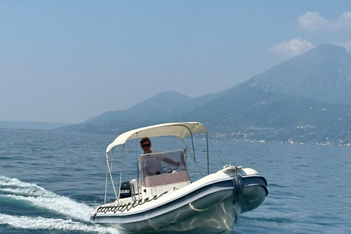 a small boat in a large body of water
